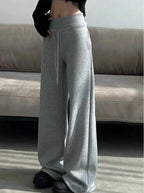 Gray high-waist loose wide-leg straight pants for women, casualwear by Plush Fashion Hub, shown on a model.