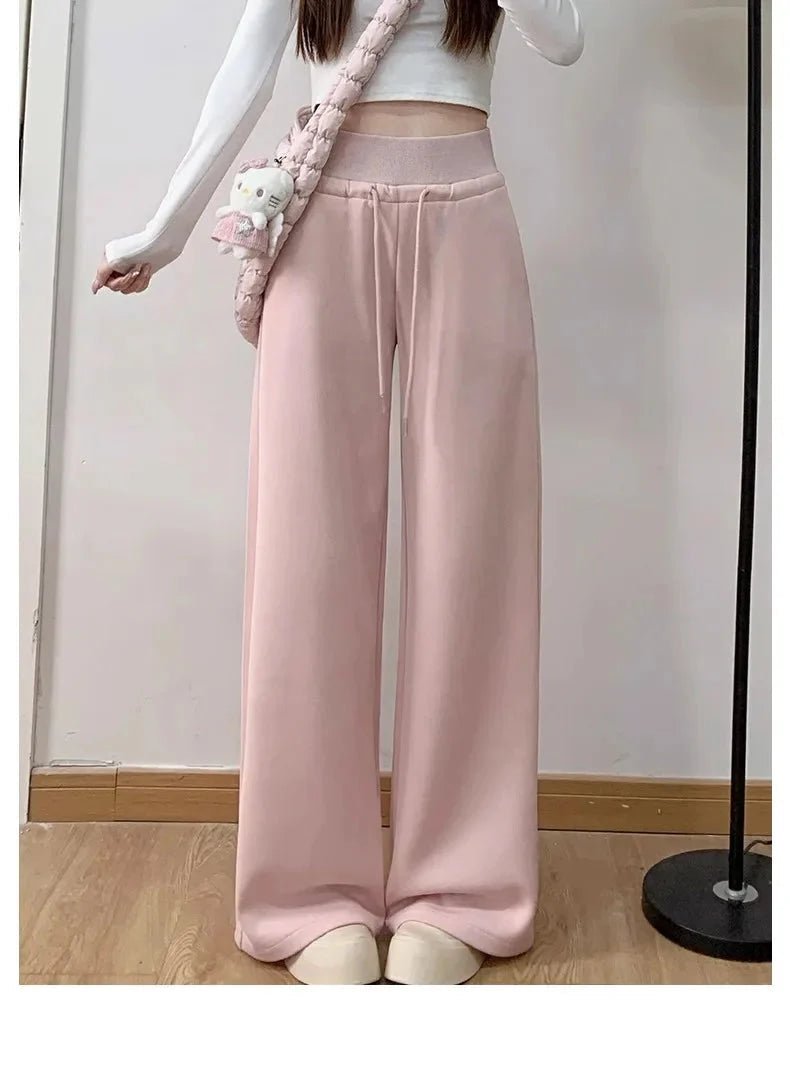 Gray high-waist loose wide-leg straight pants for women, casualwear by Plush Fashion Hub, shown on a model.