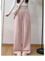 Gray high-waist loose wide-leg straight pants for women, casualwear by Plush Fashion Hub, shown on a model.