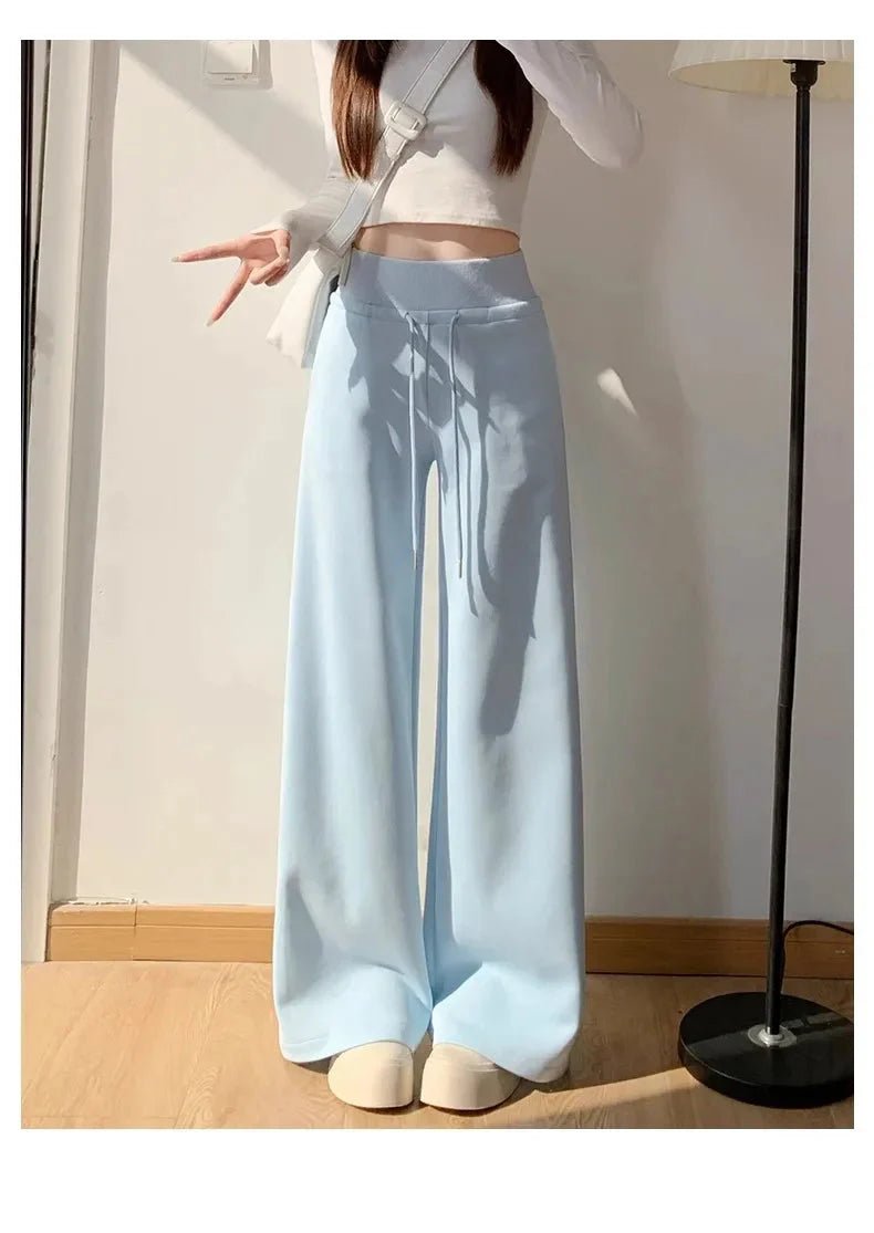 Gray high-waist loose wide-leg straight pants for women, casualwear by Plush Fashion Hub, shown on a model.