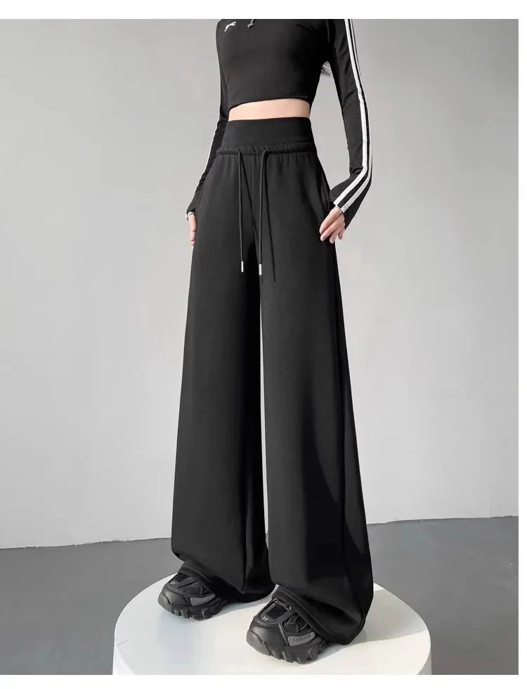 Gray high-waist loose wide-leg straight pants for women, casualwear by Plush Fashion Hub, shown on a model.