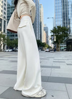 Gray high-waist loose wide-leg straight pants for women, casualwear by Plush Fashion Hub, shown on a model.