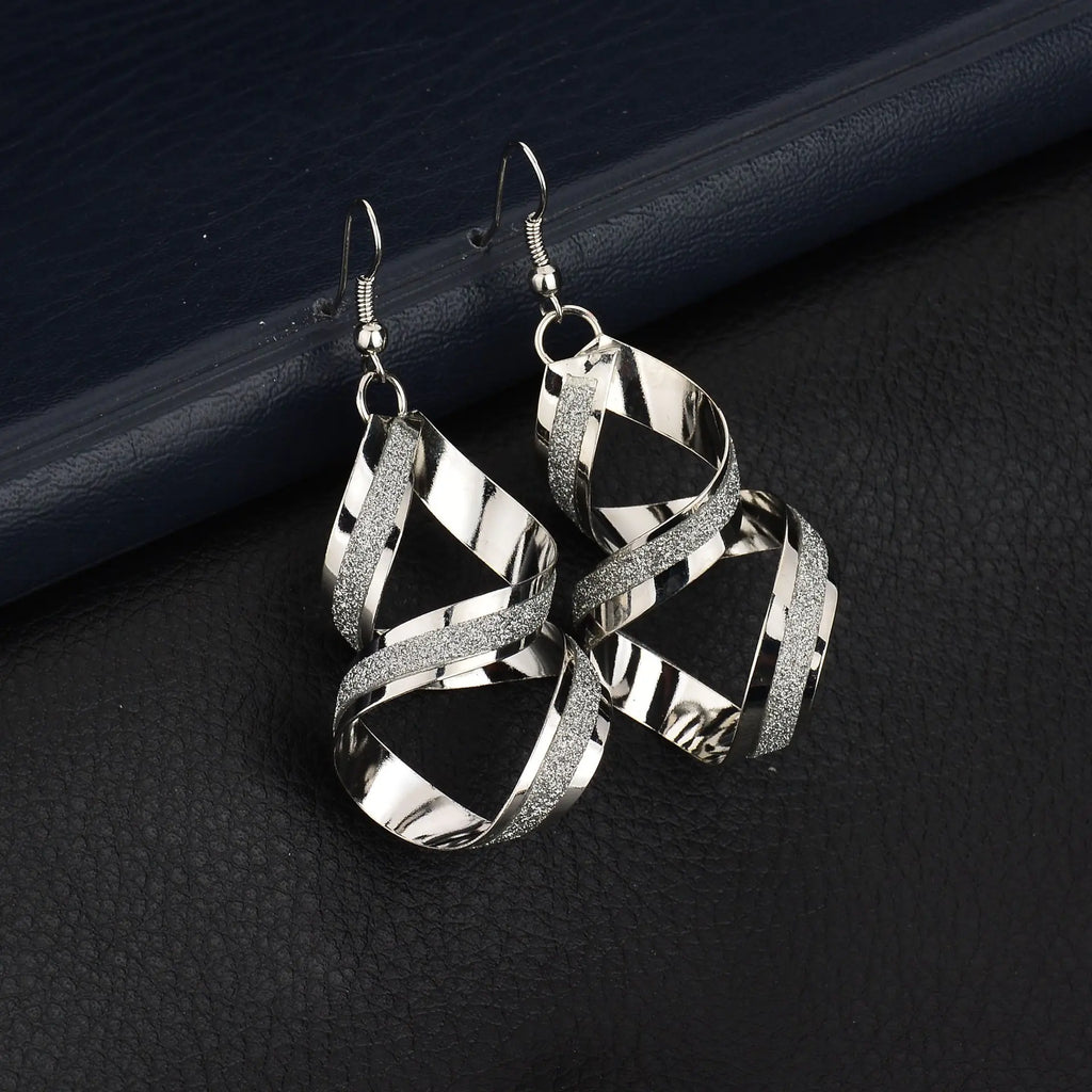 Fashion trendy earrings and ear studs from Trendy Attic Store01, showcasing stylish jewelry with intricate designs.