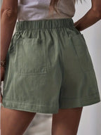 Light beige minimalist women's drawstring shorts with side pockets, casual style, from Trendy Attic Store01.