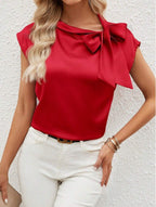 Bella Mia satin women's top with a half-open collar, bow detail, and special interest design, perfect for stylish casual wear.