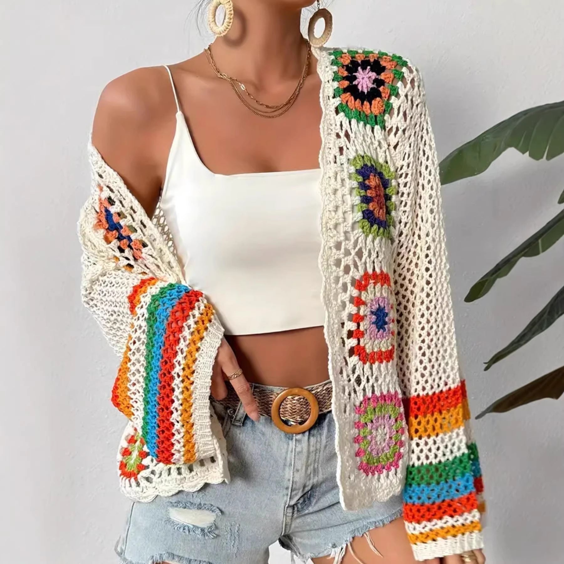 Hand-crocheted knitted women's cardigan by FitiqueFit featuring a cozy, textured design and long sleeves.