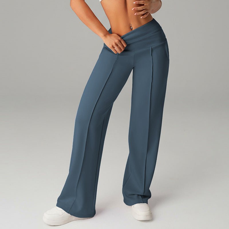 High-waisted loose-fitting wide-leg women's sweatpants in casualwear style by FitiqueFit, shown on a model.