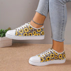Low top floral canvas shoes for women with breathable design, stylish and comfortable footwear from Trendy Attic Store01.