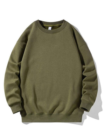 Men's solid color round neck long sleeve sweatshirt in green.