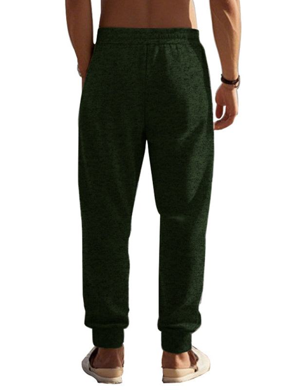 Men's casual cationic slim fit sweatpants with zipper cuffs, back view.