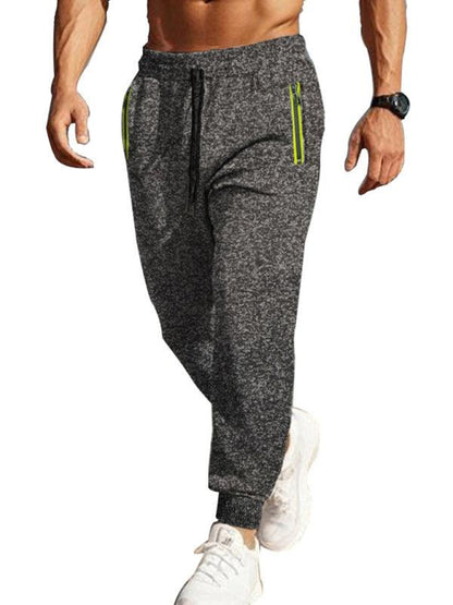 Men's sports casual cationic slim fit sweatpants with zipper cuffs.