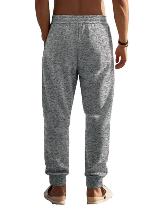 Men's sports casual cationic slim fit sweatpants with zipper cuffs.