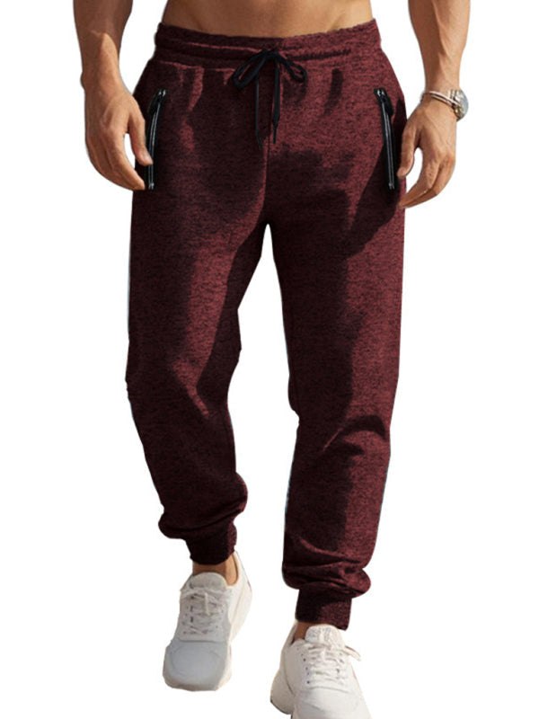 Men's sports casual cationic sweatpants with zipper cuffs, slim fit design.