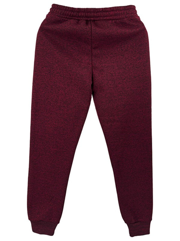 Men's sports casual cationic zipper cuffs slim fit sweatpants in maroon.