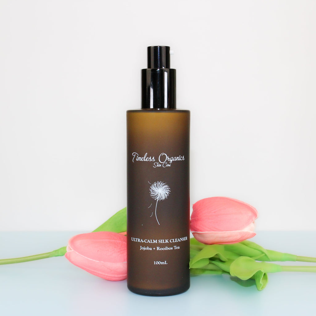 Timeless Organics Skin Care Ultra-Calm Silk Cleanser in a sleek bottle, designed for gentle facial cleansing and soothing skin.