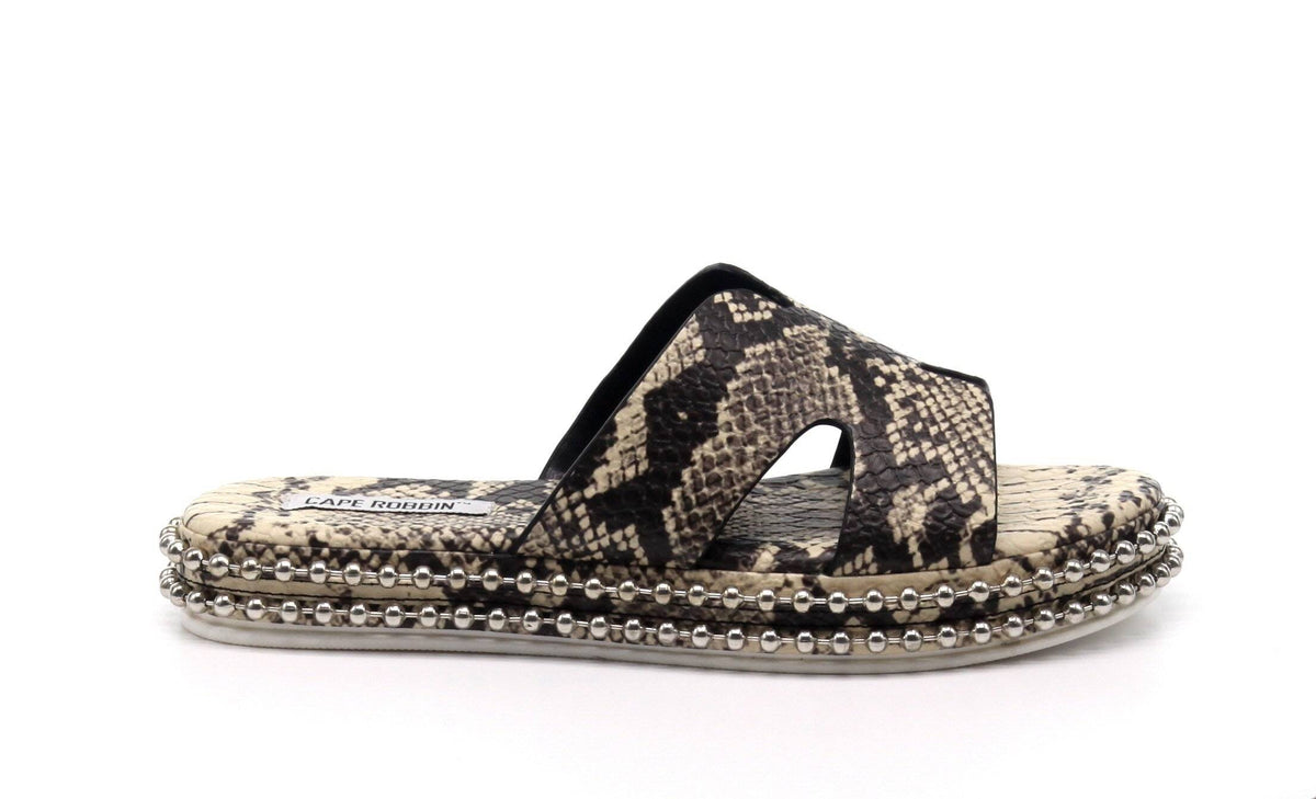 Snake print Plush Fashion Hub footwear featuring stylish rush design, close-up view of the trendy snake pattern and textured sole.