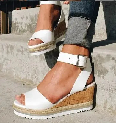 Women’s wedge heel sandals with buckle closure from Trendy Attic Store01, featuring open toe design and ankle strap.