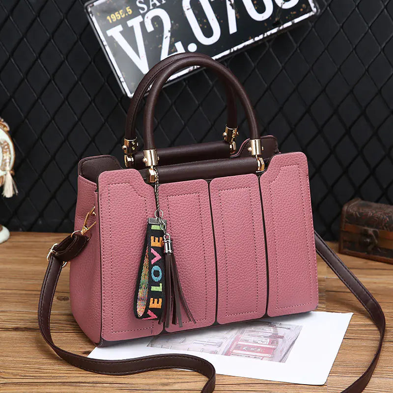 Women's shoulder tote bag from Plush Fashion Hub, stylish purse with spacious interior and elegant design.