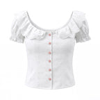 White lace-collar bubble sleeve top by Bella Mia featuring a retro single-breasted design, cutout embroidery, and a fitted waist.
