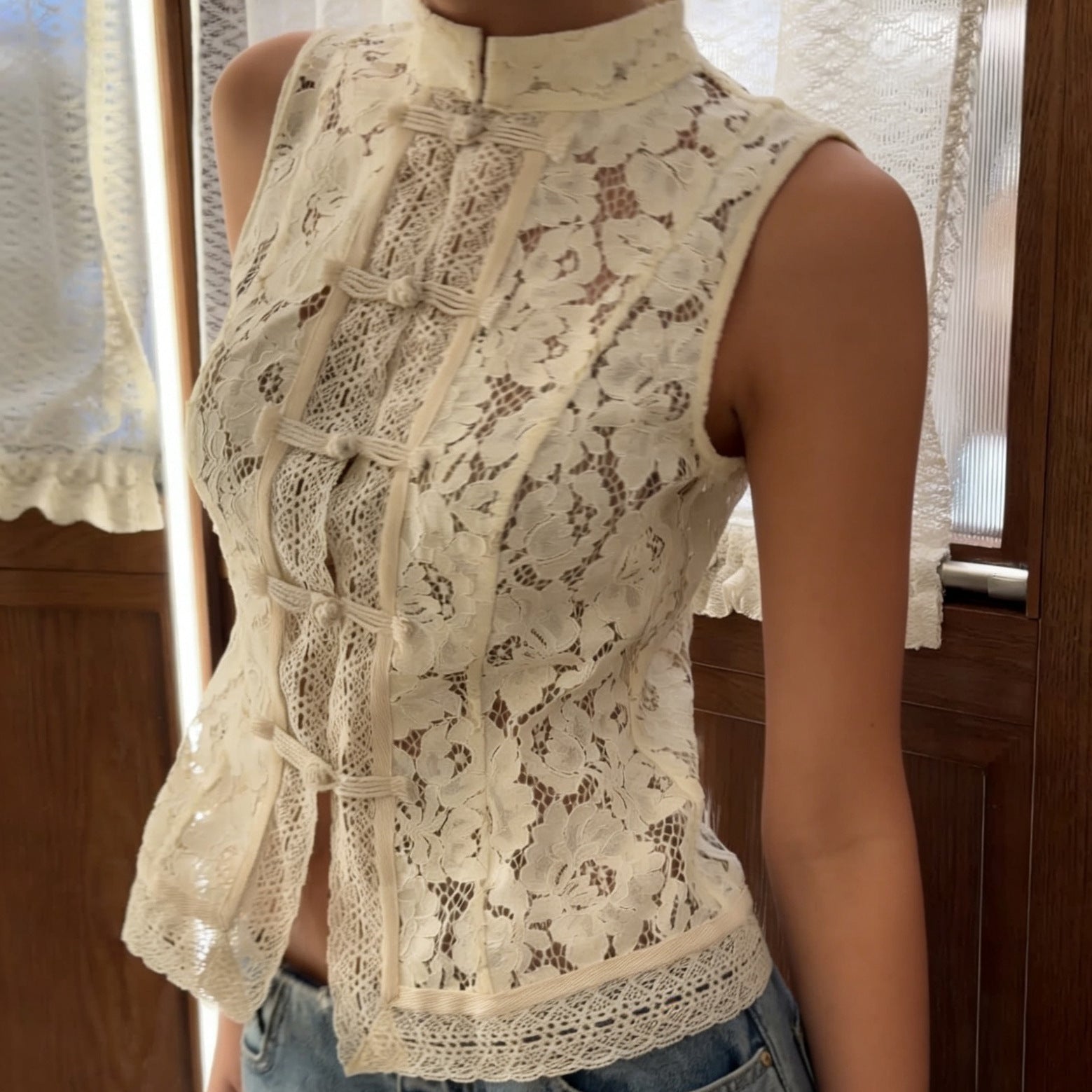 Lace crochet sleeveless top with stand collar in three colors, slim fit, casualwear from FitiqueFit, available in S to L sizes.