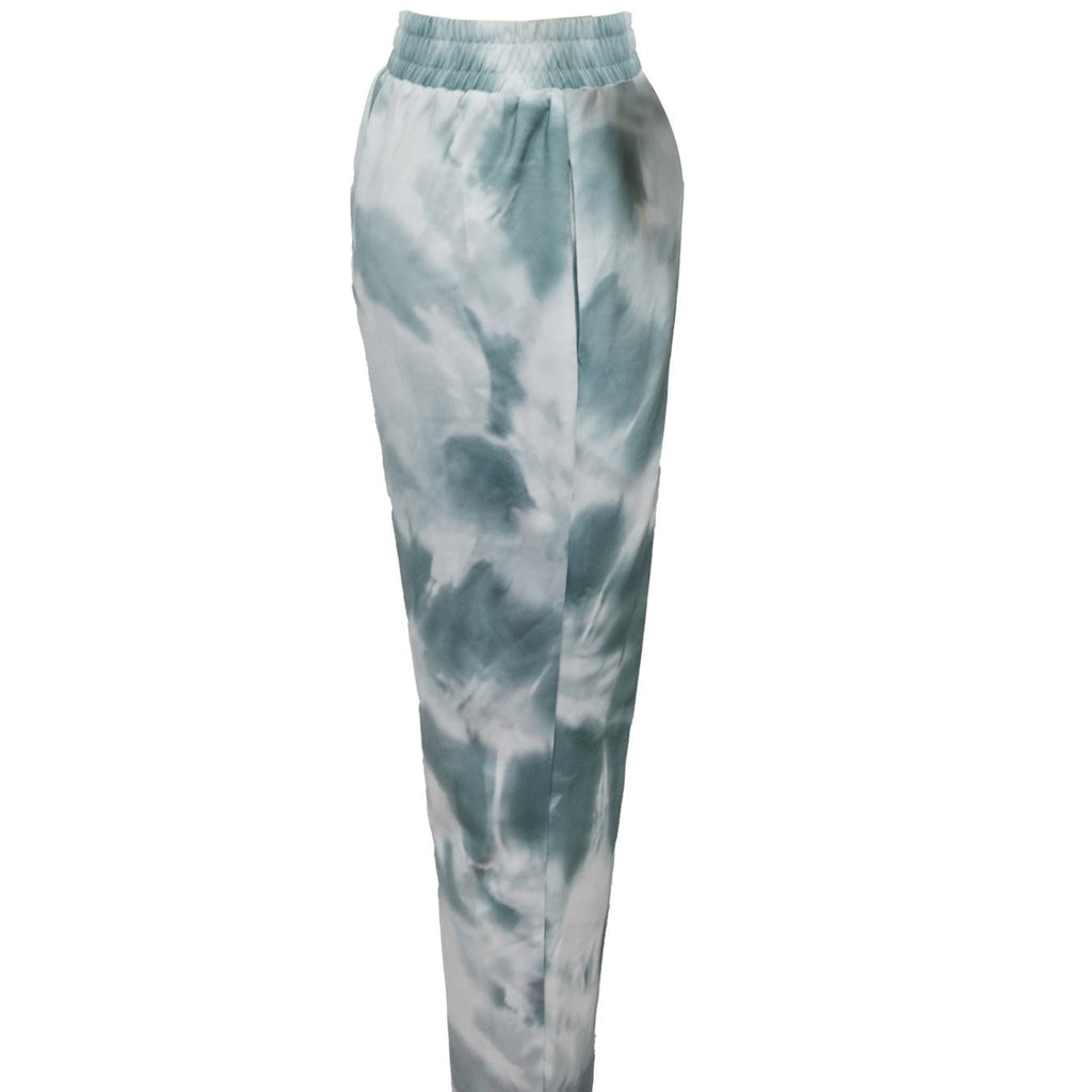 Ladies' tie dye pants by FitiqueFit, trendy casualwear with vibrant colors, perfect for sports and leisure activities.