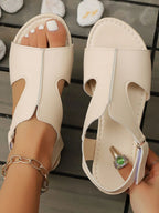 Women's chic PU leather ankle strap flat sandals from Trendsi, featuring comfortable summer footwear design and stylish ankle strap.