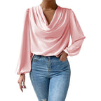 Loose long-sleeved V-neck top by Bella Mia, stylish women's draped T-shirt with relaxed fit and modern design.