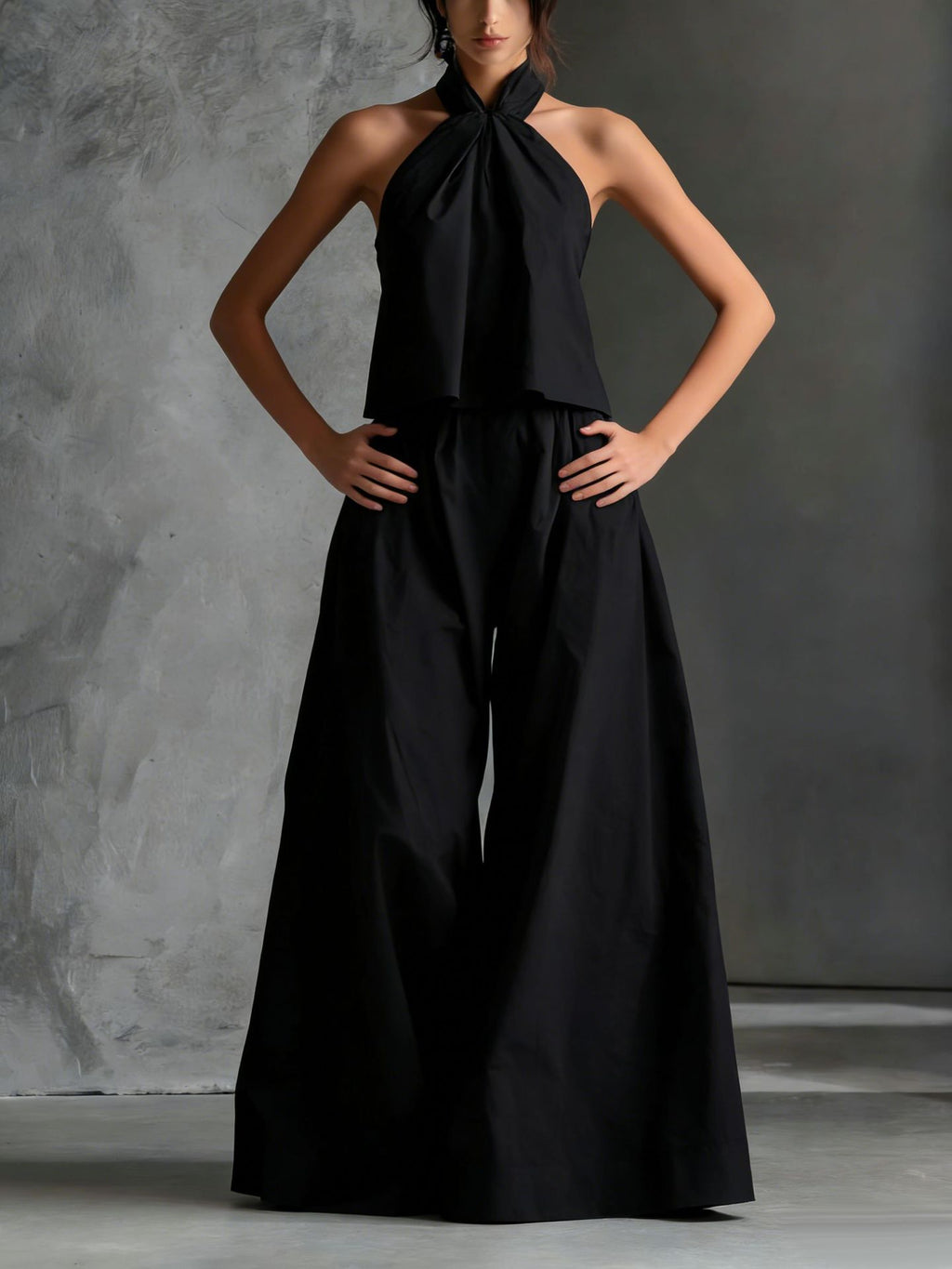 Casualwear two-piece set by FitiqueFit featuring a loose sleeveless top and wide-leg pants, perfect for comfortable everyday wear.