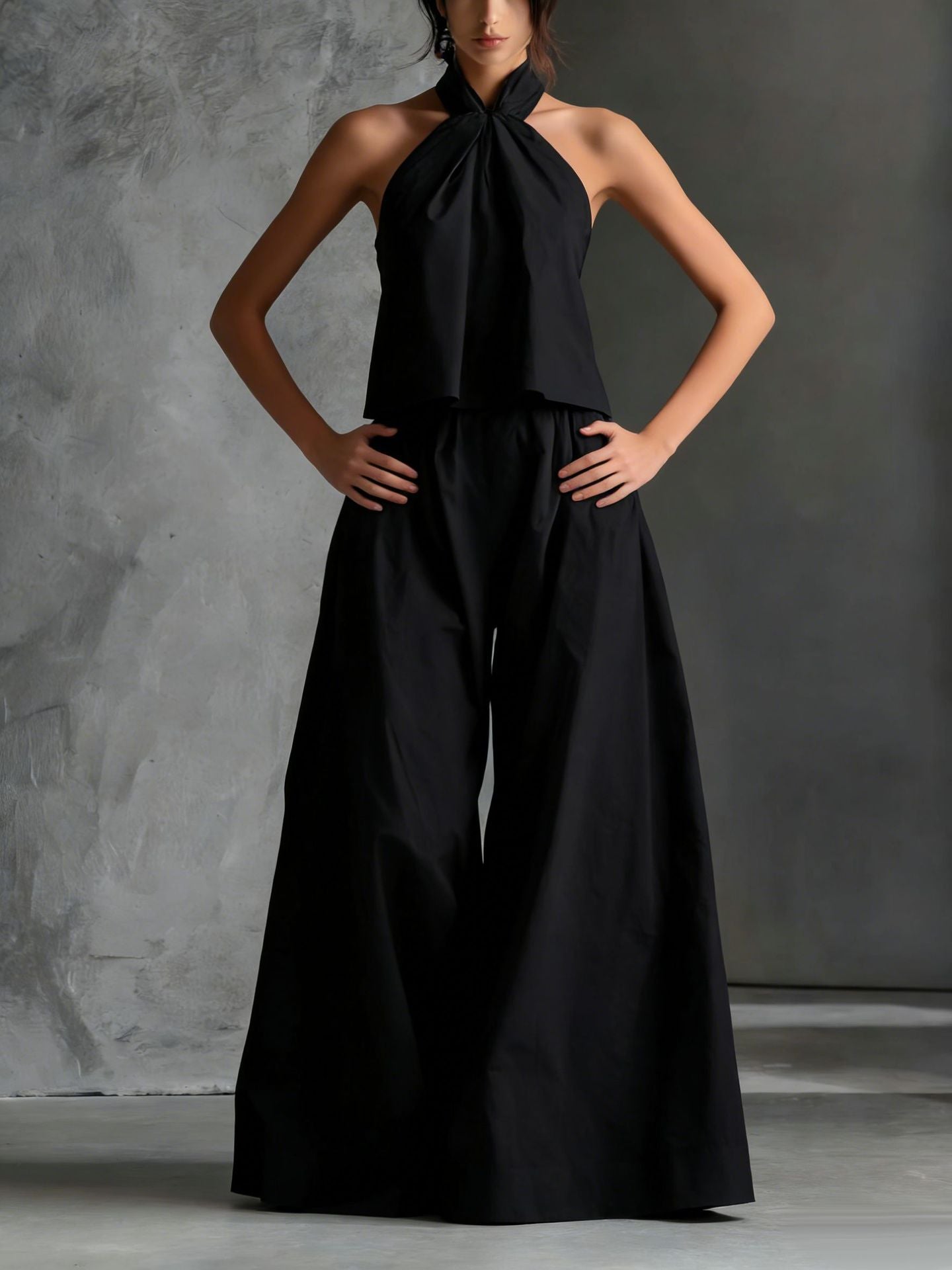 Casualwear two-piece set by FitiqueFit featuring a loose sleeveless top and wide-leg pants, perfect for comfortable everyday wear.