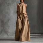Casualwear two-piece set by FitiqueFit featuring a loose-fitting sleeveless top and wide-leg pants, ideal for relaxed style.