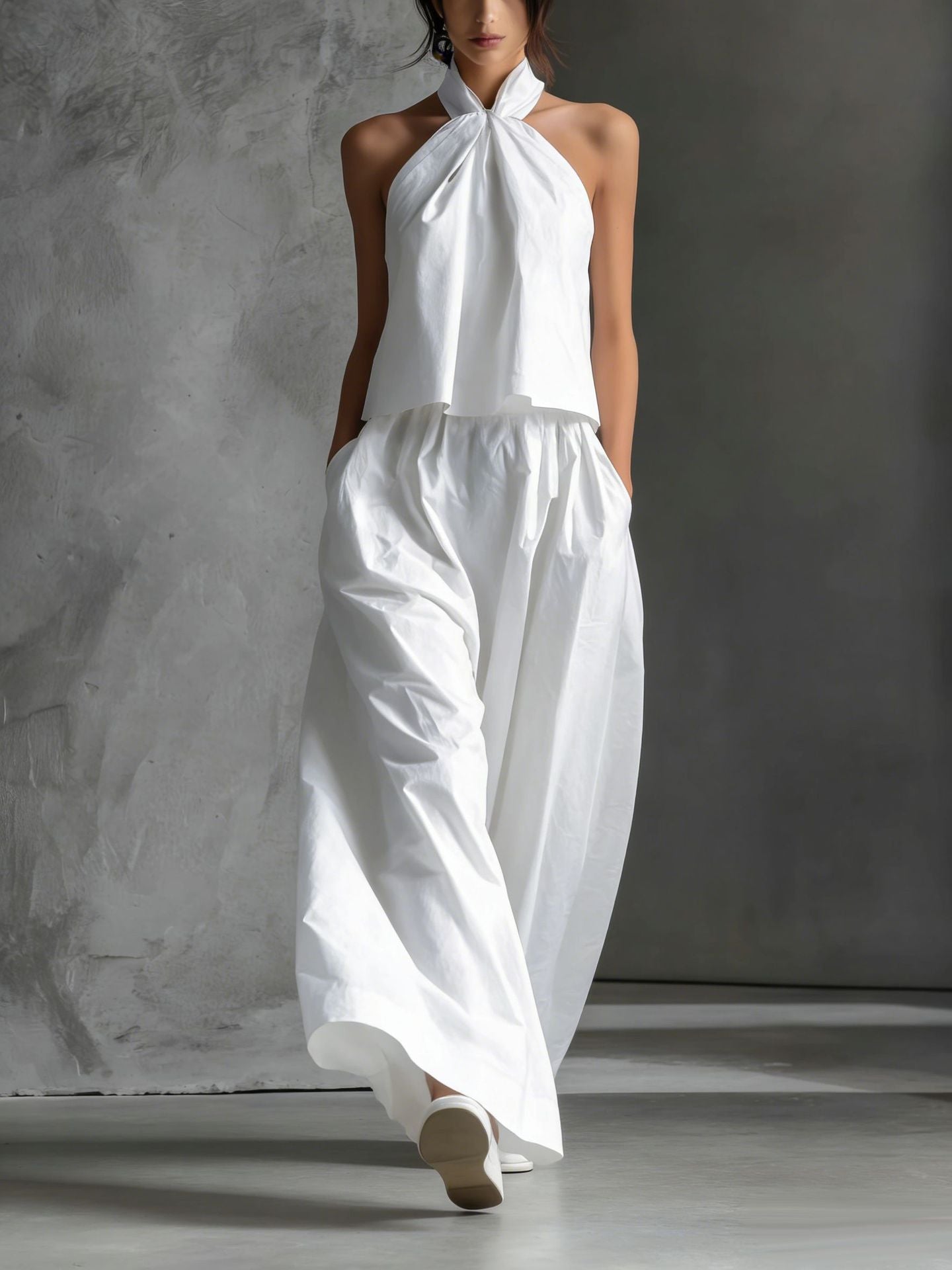 Casual FitiqueFit two-piece set with loose sleeveless top and wide-leg pants, perfect for relaxed, stylish everyday wear.