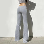 Low-waisted solid flare boot-cut pants for women by FitiqueFit, casualwear with a relaxed fit and stylish flare design.