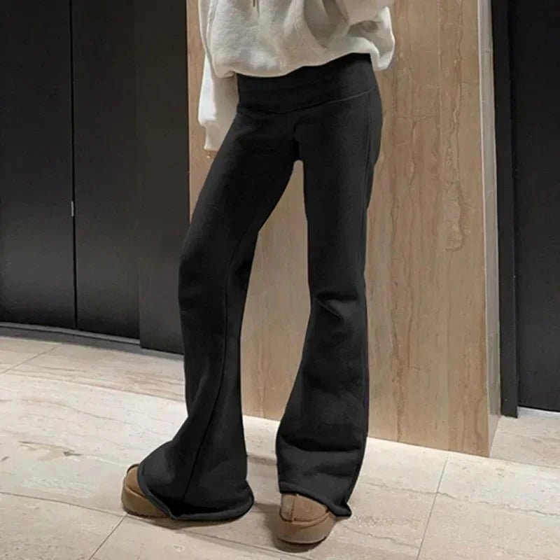 Low-waisted solid flare boot-cut pants for women in casualwear style, featuring a flattering fit and stylish silhouette.