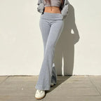 Low-waisted solid flare boot-cut pants for women by FitiqueFit, casualwear style with a relaxed fit and stylish flare design.