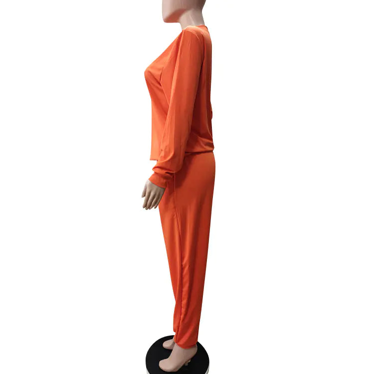 Plus size women's casual two-piece outfit by Plush Fashion Hub, featuring a comfortable top and matching pants.