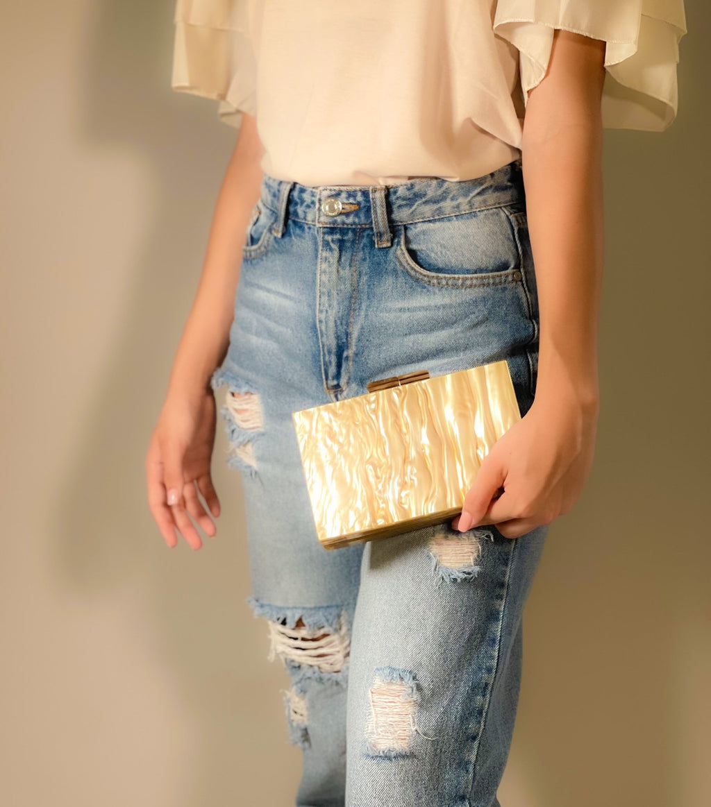 Black Luxe Clutch bag from Plush Fashion Hub, featuring a sleek design and elegant style for evening occasions.