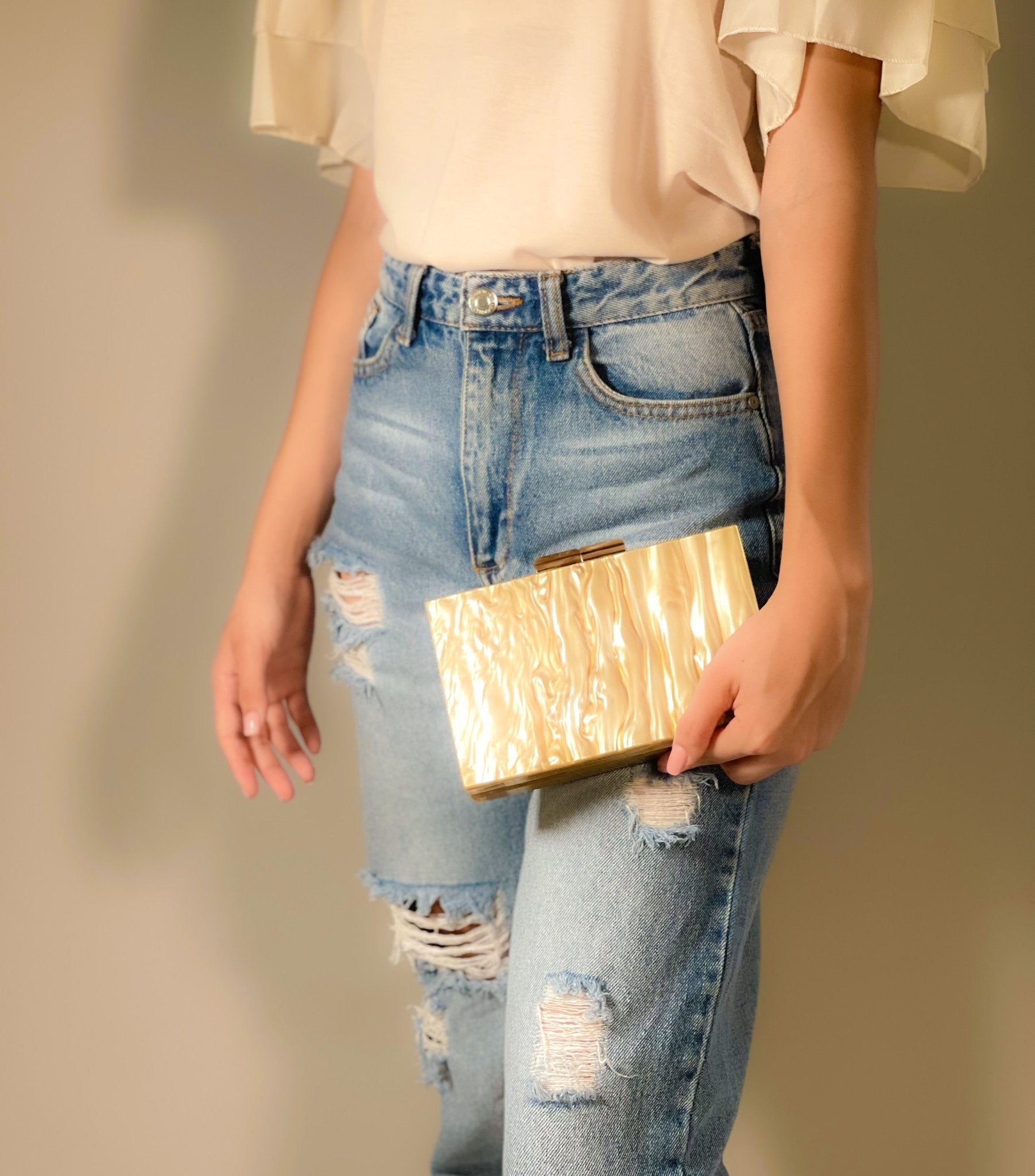 Black Luxe Clutch bag from Plush Fashion Hub, featuring a sleek design and elegant style for evening occasions.