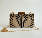 Black Luxe Clutch bag from Plush Fashion Hub with a sleek design, perfect for evening or formal occasions.