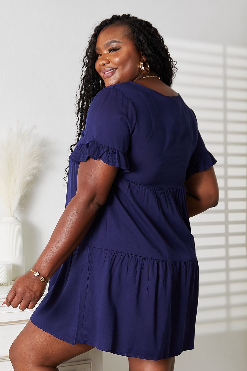 Women’s Mandy solid V-neck casual dress with tiered flounce sleeves by Plush Fashion Hub, featuring a relaxed fit and stylish design.