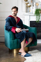 Men’s plush hooded robe by Lotus Linen, ultra-soft and comfortable for everyday wear, shown hanging with a cozy appearance.