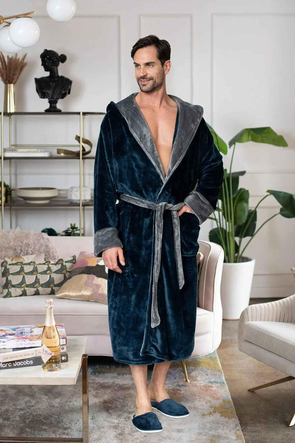 Men’s plush hooded robe by Lotus Linen, ultra-soft and cozy, shown hanging with a front view highlighting the hood and plush fabric.