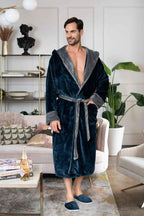 Men’s plush hooded robe by Lotus Linen, ultra-soft and cozy, shown hanging with a front view highlighting the hood and plush fabric.