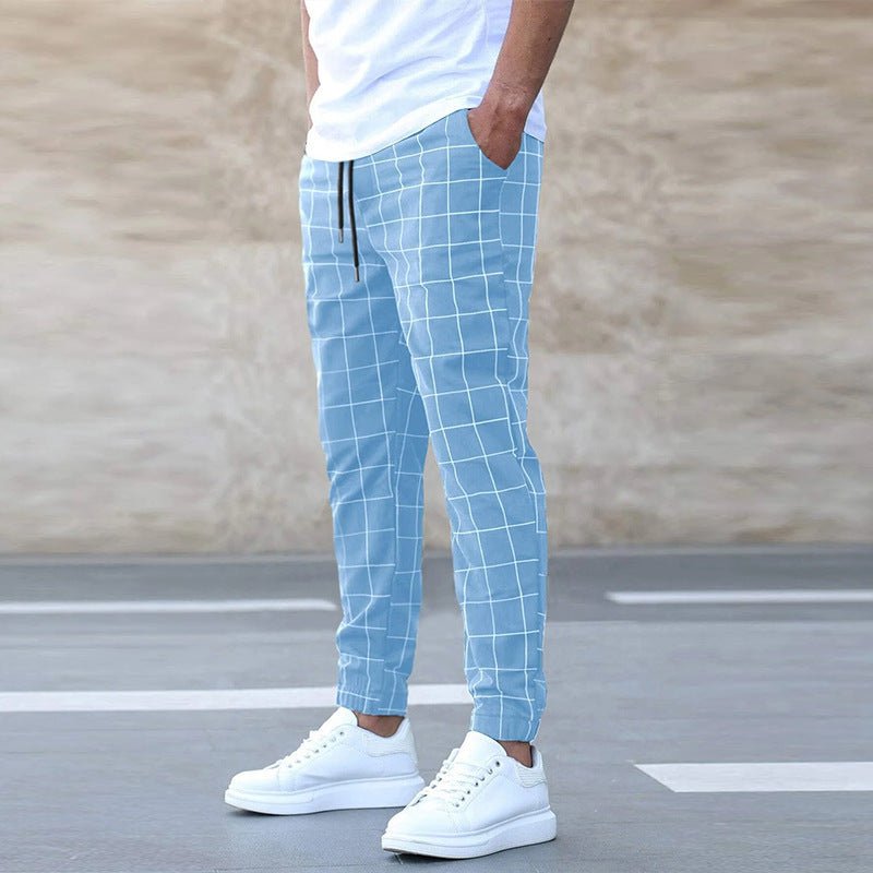 Men's plaid print casual trousers by FitiqueFit featuring drawstring waist and relaxed fit for everyday wear.