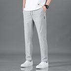 Men's Ice Silk Plus Size Straight-Leg Casual Pants by FitiqueFit, showcasing smooth fabric and relaxed fit in a neutral color.