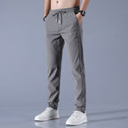 Men's Ice Silk Plus Size Straight-Leg Casual Pants by FitiqueFit, lightweight and comfortable men's casualwear in a sleek style.