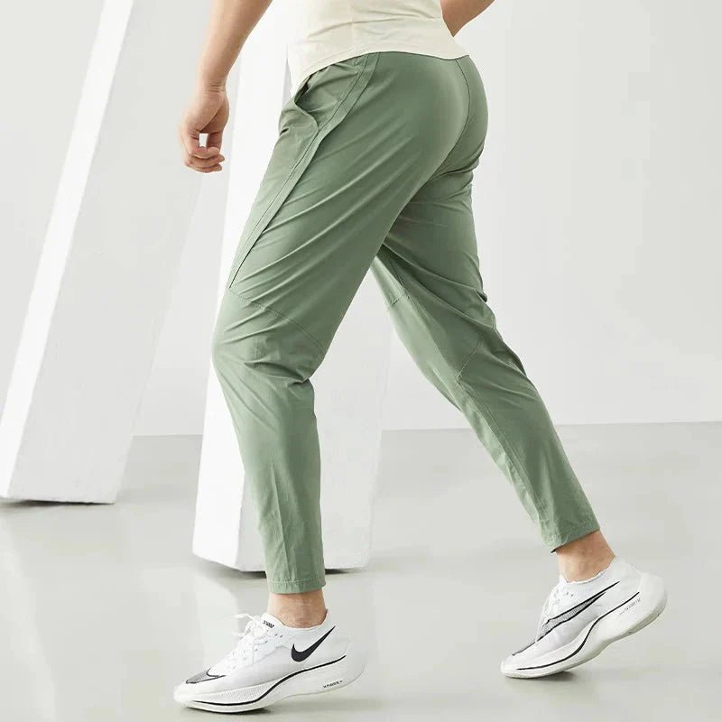 Men's black quick-dry running joggers by FitiqueFit, made for comfortable casualwear and active workouts.