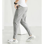 Black men's quick-dry running joggers by FitiqueFit, casualwear athletic pants with breathable fabric for active wear.