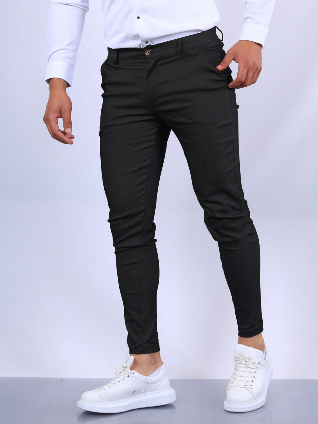 Men's slim fit button trousers from FitiqueFit, versatile for office and casual wear, shown in a neutral color with a tailored fit.