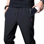 Men's slim fit cargo jogger pants with elastic waist from FitiqueFit, showcasing casual stretch fabric and relaxed fit.
