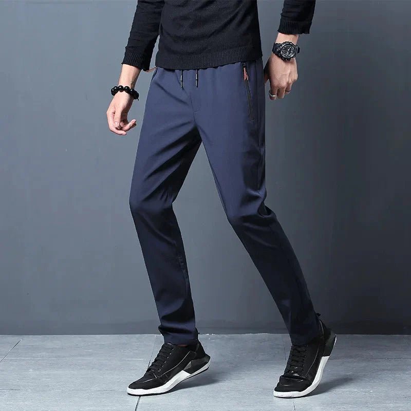 Men's stretch slim fit cargo jogger pants by FitiqueFit with elastic waistband, casualwear style, shown in a relaxed fit.